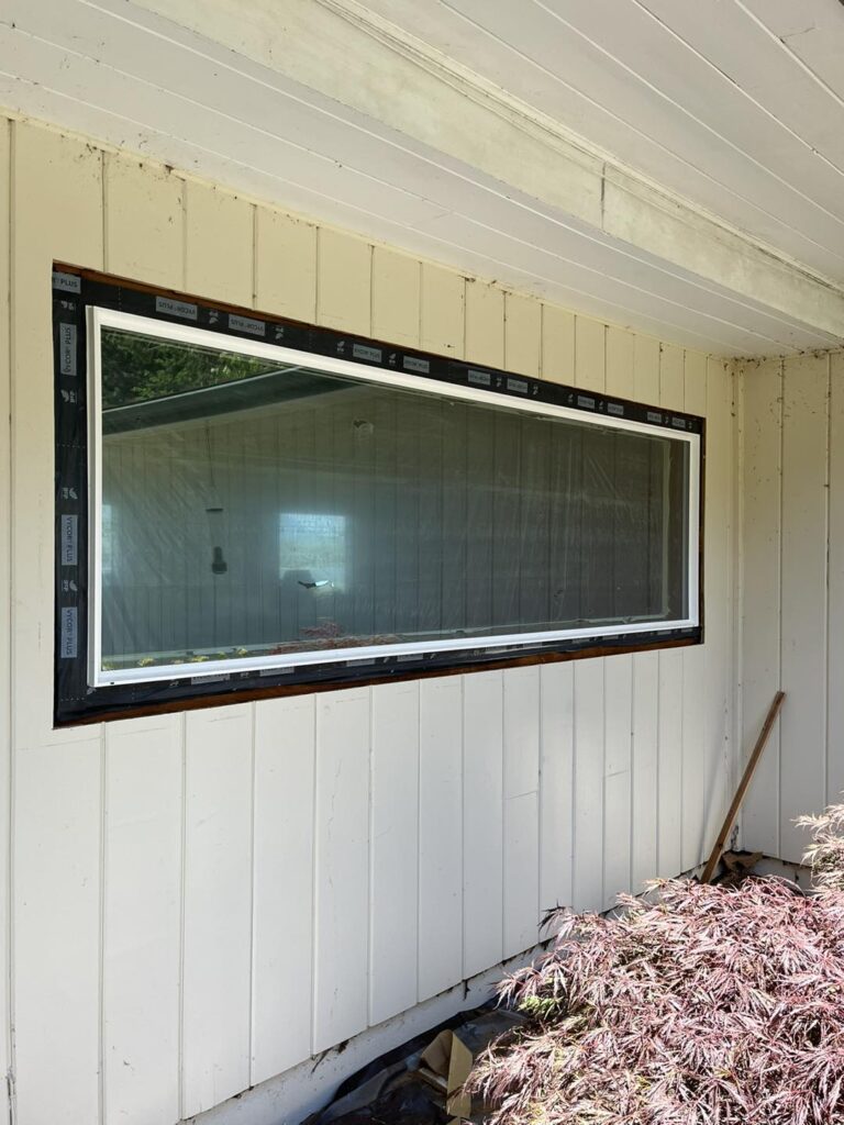 Groves Glass team installing custom windows i